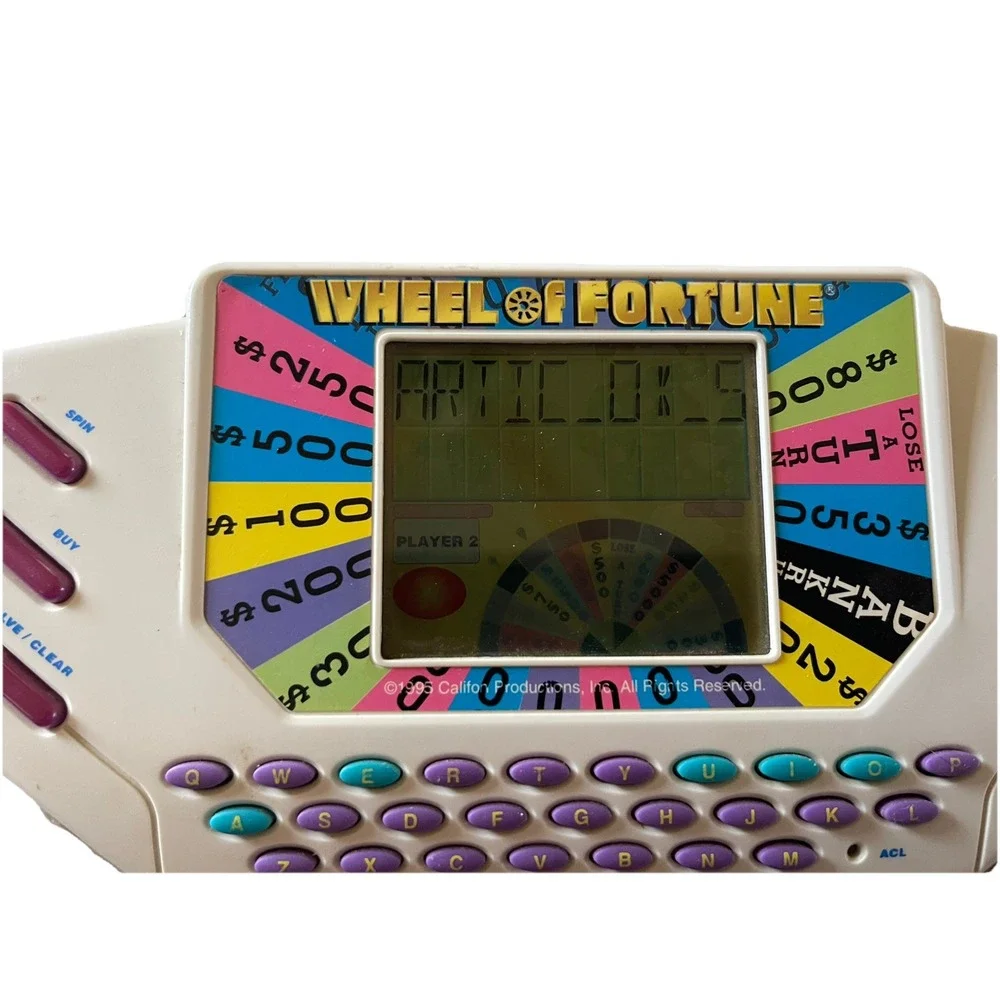 Vintage Tiger Electronics Wheel of Fortune Handheld Game Fun Family Working 1995